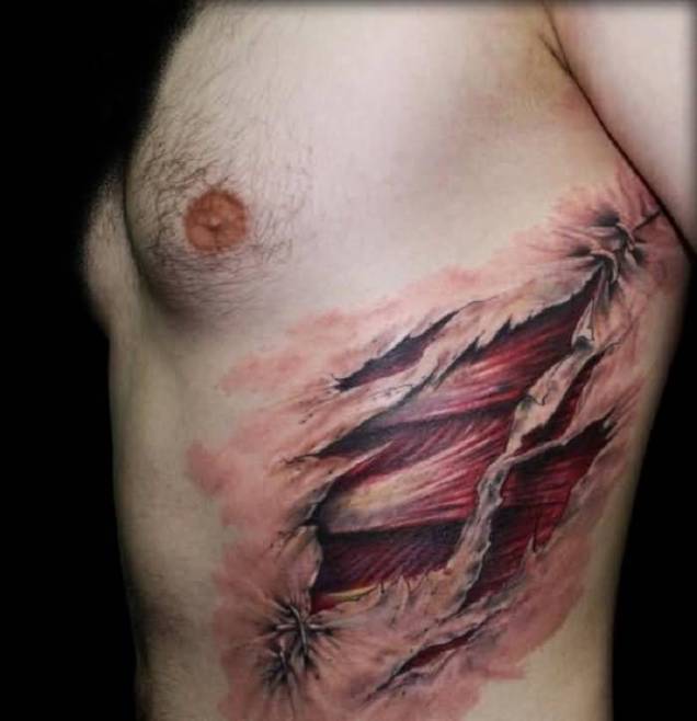ripped skin tattoos ribs